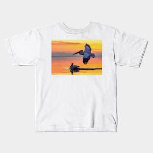 Pelican At In Flight At Sunset Kids T-Shirt